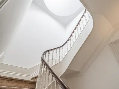 a staircase in a house with a white ceiling at Malmerendas Boutique Lodging in Porto