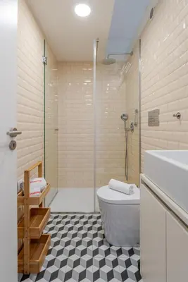 a bathroom with a shower and a toilet and a sink at New!! Oporto D Joao IV in Porto