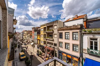 an overhead view of a city street with buildings at O'Porto Main Street St Catarina 2 DOWNTOWN in Porto