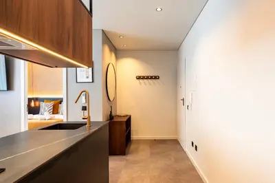 a kitchen with a sink and a counter top at DoisPontoZero Fonseca Cardoso in Porto