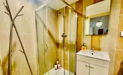 a bathroom with a shower and a sink at aiPorto downtown, family&friends 2! in Porto