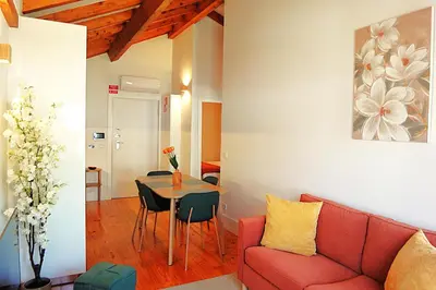 a living room with a red couch and a table at PORTO SWEETHEART - Ricardo Jorge in Porto