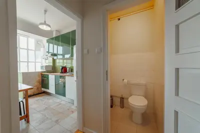 a bathroom with a toilet and a sink at Cedofeita Terrace by Hosty in Porto