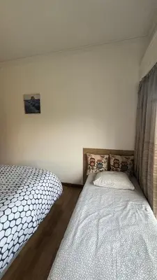 a bedroom with two twin beds in it at Covelo in Porto