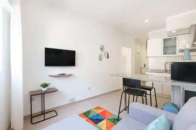 a bathroom with a shower and a sink and a toilet at VIVA Elias Sunset Apartment Gaia in Vila Nova de Gaia