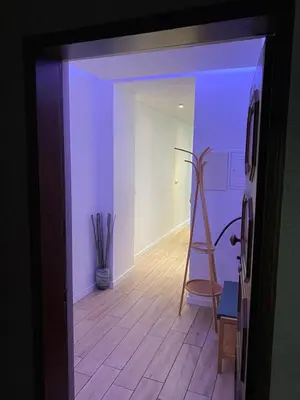 a room with a room with a ladder and a chair at Apartamento Formosa in Porto