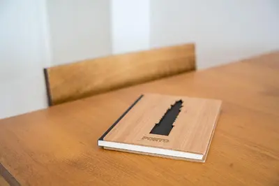 a book sitting on top of a wooden table at GuestReady - Explore Porto from a prime location in Porto