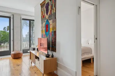 a bedroom with a bed and a painting on the wall at GuestReady - Explore Porto from a prime location in Porto