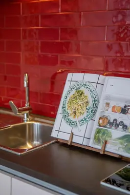 a plate of food sitting on a counter next to a sink at Almada 151 - 2F in Porto