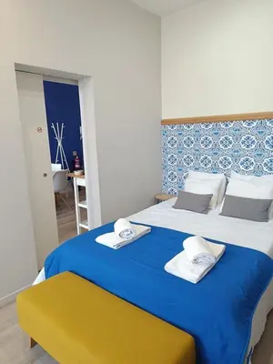 a bedroom with two beds with towels on them at Porto Alma 388 - Silent city center in Porto