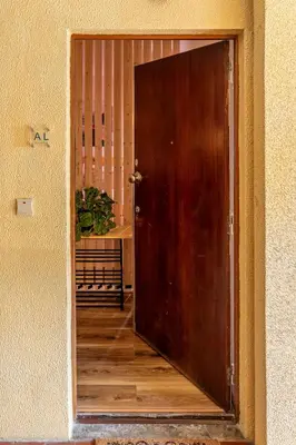 an open door to a room with a plant at NEW! Gaia Arrabida in Vila Nova de Gaia