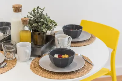 a table with two plates and two bowls of food at Modern Invicta by Upperground in Porto