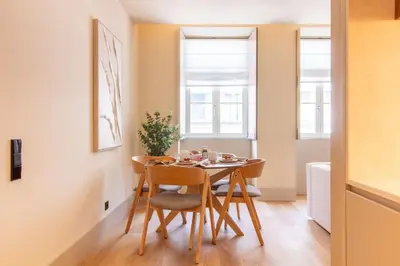 a small dining room with a table and chairs at Catarina 392 by LovelyStay in Porto