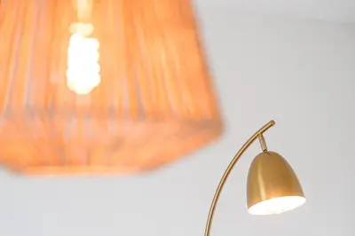 a lamp sitting in a room next to a wall at GuestReady - Splendid Retreat in Porto in Porto
