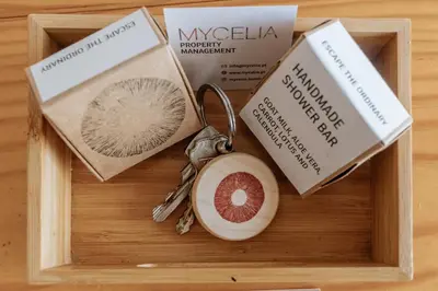 a wooden box with a pair of keys and other items at Palácio de Cristal, Porto Apartment by Mycelia in Porto