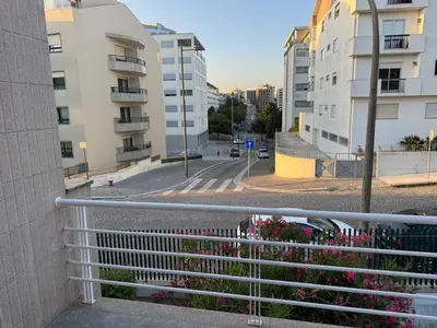 a view of a city street with tall buildings at Hostel Antas Porto in Porto