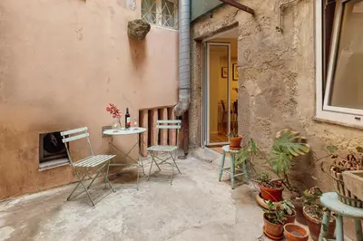 an empty street in an alley with buildings at Charming Apartment by Hosty in Porto