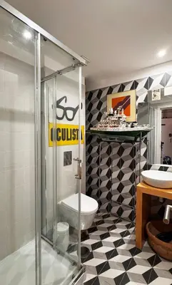 a bathroom with a shower and a toilet and a sink at Caligrafia - Artistic Studio in Porto