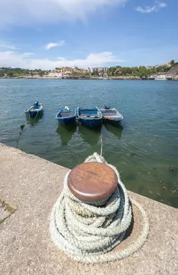a group of boats are docked in the water at Gaia Land Sea View Apartment in Vila Nova de Gaia