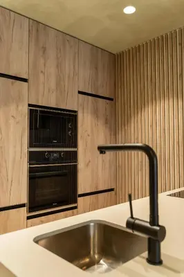 a kitchen with a sink and a microwave at ORM - Santa Teresa Apartments in Porto