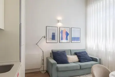 two pillows sitting on top of a bed at Liiiving in Porto - Urban Retreat Apartment in Porto