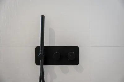 a black object is hanging on a wall at GuestReady - Stylish base steps from attractions in Porto