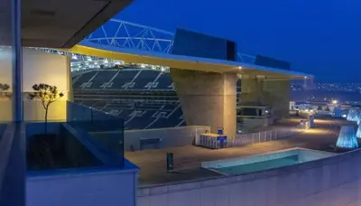 a view of a baseball stadium at night at Porto H Dragão in Porto