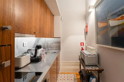 a kitchen with a counter top with a appliance at GuestReady - Tempting getaway in Porto in Porto