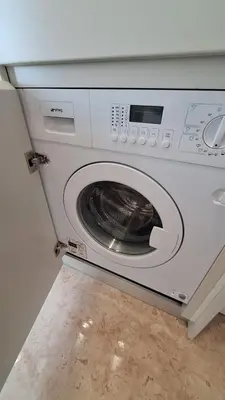 a washing machine with its door open in a kitchen at Quinta de Sao Marcos Suite Deluxe in Vila Nova de Gaia
