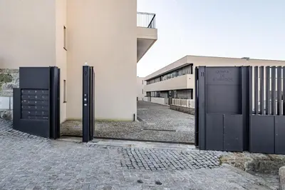 an entrance to a building with two open doors at Quinta de Sao Marcos Suite Deluxe in Vila Nova de Gaia