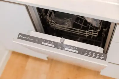 an empty refrigerator with its door open in a kitchen at Studio Dash | 111 Collection in Porto