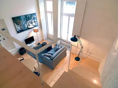 an overhead view of a living room with a couch at FLH Porto Modern Flat in Porto