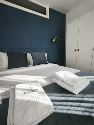a pillow with the porto views logo on it at Best Deal Porto Apartment - Porto Velho Apt in Porto