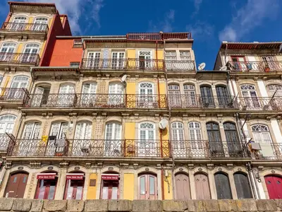 a tall building with balconies on the side of it at Apartment with Balcony for 4 Guests in Porto