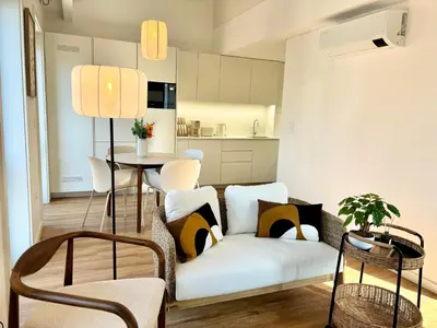 a living room with a couch and a table at AC, 2Bedrooms APT, City Center 900m to Metro in Porto
