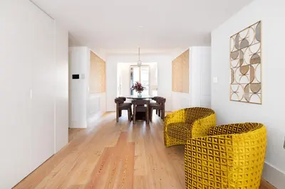 a living room with a table and two chairs at Sa Bandeira Signature Apartment in Porto