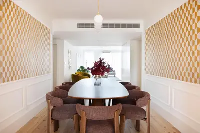 a dining room with a table and chairs at Sa Bandeira Signature Apartment in Porto