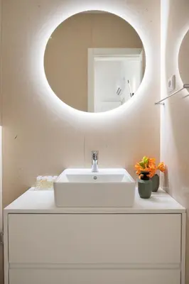 a bathroom with a white sink and a mirror at 89 T3 - Flores Gem in Porto