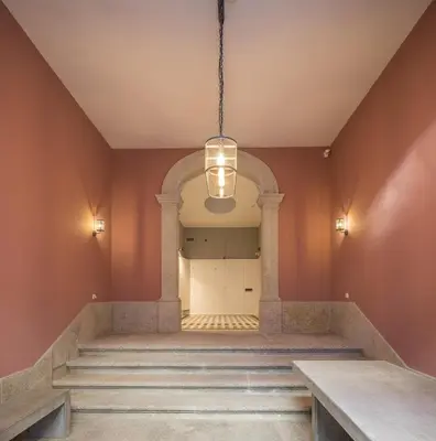 a hallway with stairs and a light fixture at Oporto Serviced Apartments - Cedofeita in Porto