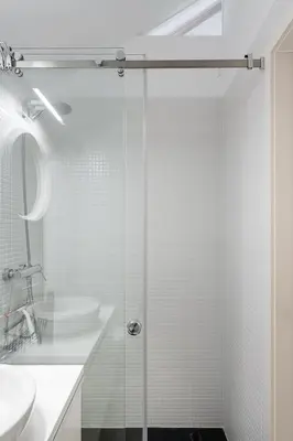 a bathroom with a shower and a sink at GuestReady - Lovely nook with mezzanine in Porto