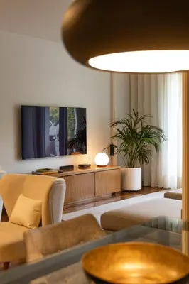 a living room with a couch and a table at Porto Pátio by MP in Porto
