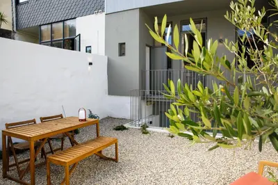 a living room with a couch and a table at Casa Aurelia in Porto