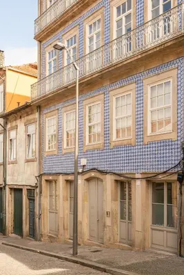 a blue and white building with a street light at Central & Cozy Studio by HostWise in Vila Nova de Gaia