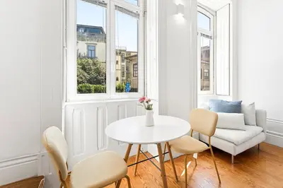 a kitchen counter with a sink and a microwave at Noa Porto by Bom Porto Apartments in Porto