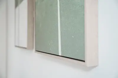 a glass window on a white wall in a room at Stylish Retreat in Central Porto Stay with Parking in Porto