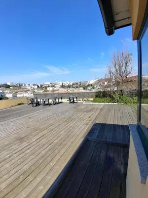 a large deck with benches and tables on it at Douro Vila 10 - Best View in Town in Bandeira