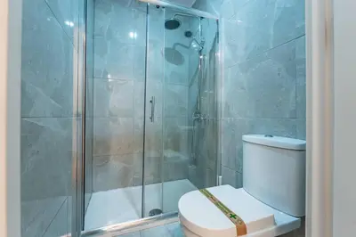 a kitchen with a washer and dryer in it at Oporto Maria Pia Apartment Whith Terrace 2 in Porto