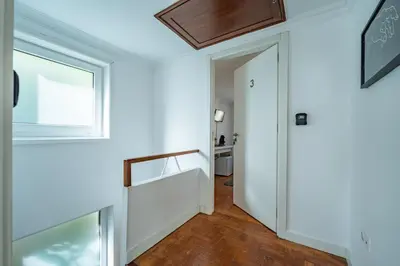 a coffee maker and a toaster next to a box at Oporto Maria Pia Suite 3 in Porto