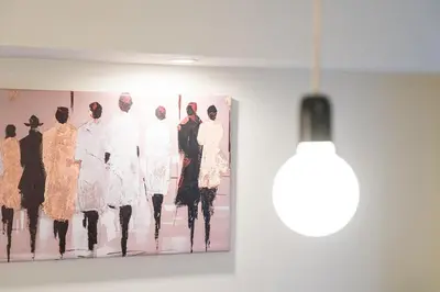 a painting of a group of people on a wall at GuestReady - Modern Porto's retreat in Porto
