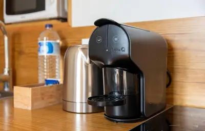 a coffee maker sitting on top of a counter at NEW! Blue Pearl Apartment in Porto